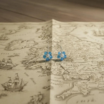 Forget me not beaded earrings with pearl centre on old Inverness map. Outlander fan gift.
